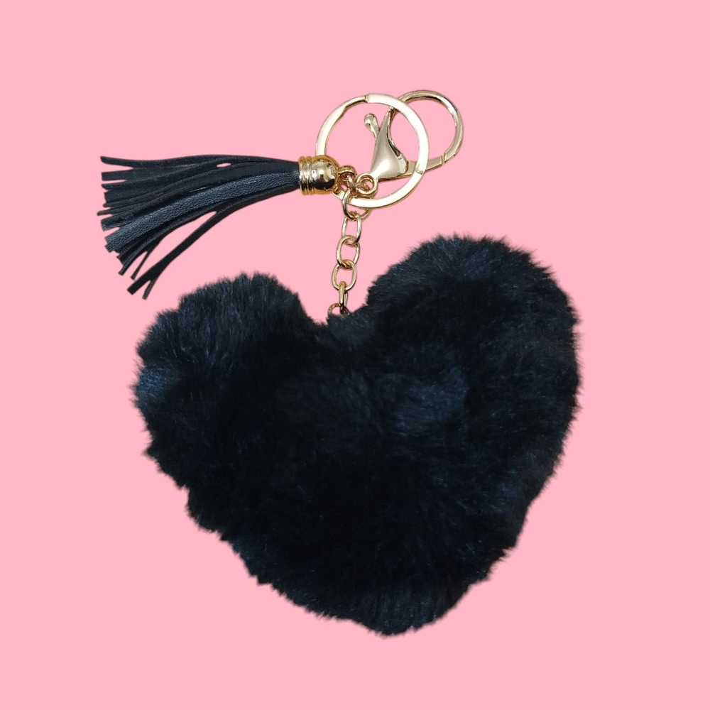 Fluffy, soft black faux fur heart keychain with leather like tassel and golden k